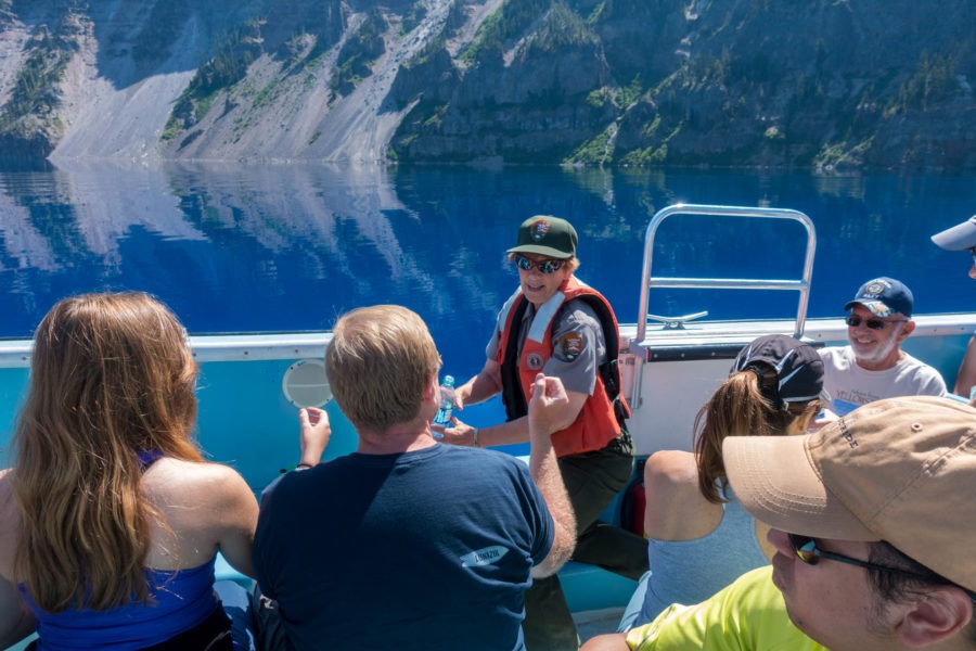 Crater Lake: Park Ranger Filling Water Bottles from the Lake