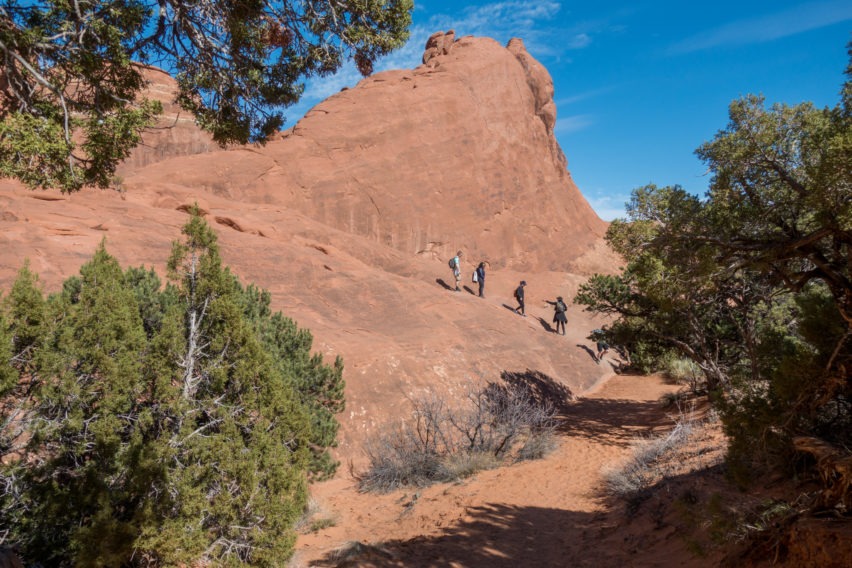 Arches: Slickrock Ascent on Private Trail in Devils Garden
